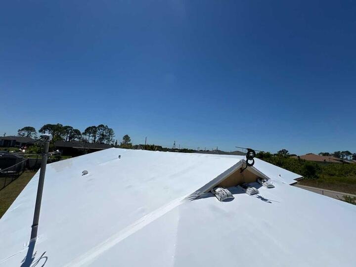 White shrink wrap covering an entire roof